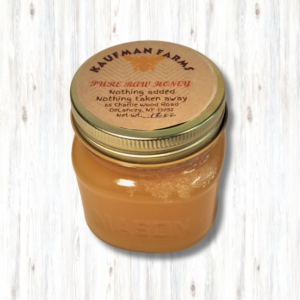honey in an embossed jar