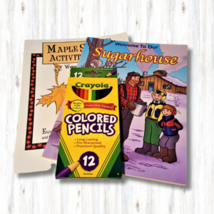 two coloring books and a pack of 12 colored pencils